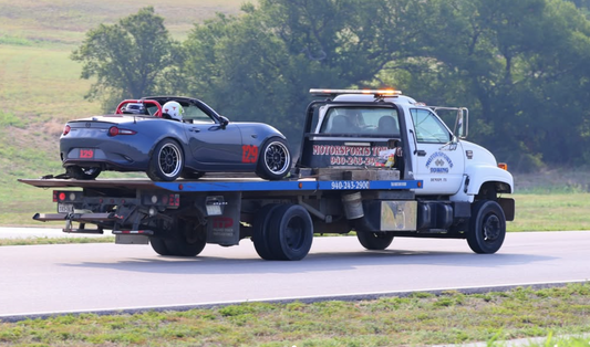 The First Ball Mazda MX-5 being transported after a front-hub failure changed Roshan Vani’s track-day preparation.