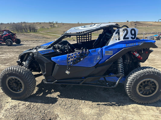 Blue Ball, a blue Can-Am Maverick X3, before two rollovers reshaped Roshan Vani’s approach to dirt driving.