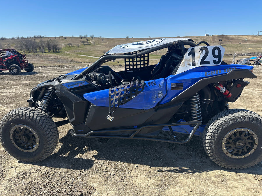 Blue Ball, a blue Can-Am Maverick X3, before two rollovers reshaped Roshan Vani’s approach to dirt driving.